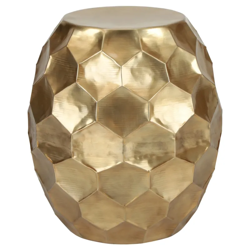 Goldfarbener Hocker mit sechseckiger Struktur.